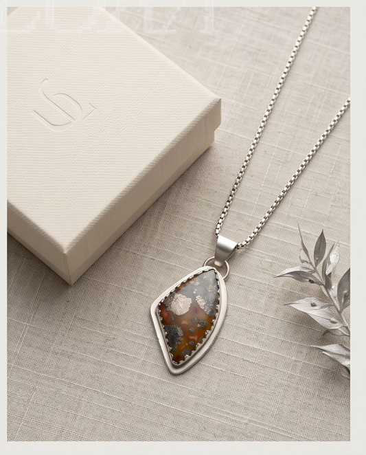 Handcrafted Marcasite statement pendant set in sterling silver with sculptural bail and twisted wire accents.