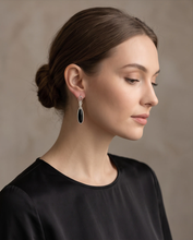 Load image into Gallery viewer, Black Onyx sterling silver drop earrings worn on model