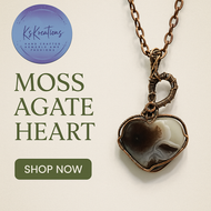 Heart-shaped Moss Agate pendant wrapped in copper wire
Handmade copper Moss Agate gemstone necklace
Artisan Moss Agate heart pendant with natural inclusions
Unique gemstone heart pendant gift for he