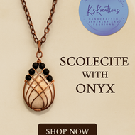 Handmade copper wire Scolecite pendant with black bead accents

Scolecite gemstone pendant necklace with copper chain

Artisan wire-wrapped Scolecite pendant with natural inclusions

Unique Scolecite gemstone jewelry gift for her