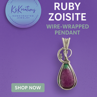 Handmade Ruby Zoisite pendant in sterling silver
Teardrop-shaped Ruby Zoisite gemstone wrapped in wire
Artisan wire-wrapped Ruby Zoisite necklace
Unique boho chic gemstone pendant, gift for her

