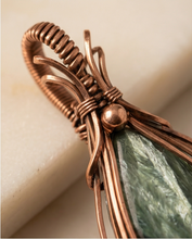 Load image into Gallery viewer, Seraphinite Wire-Wrapped Pendant – Handmade Copper Jewelry | Unique Gemstone Necklace with Silver Movement