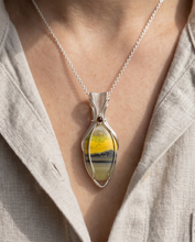 Load image into Gallery viewer, Handcrafted bumblebee jasper pendant in sterling silver with soft yellow and gray banding and elegant wire wrap design