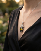 Load image into Gallery viewer, Handcrafted bumblebee jasper pendant in sterling silver with bold yellow and black banding and wire wrapped design