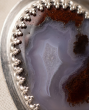 Load image into Gallery viewer, Heart shaped agate pendant framed in sterling silver with decorative edge detail.
