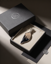 Load image into Gallery viewer, Heart shaped Palm Root stone pendant set in sterling silver featuring natural fossilized patterns.