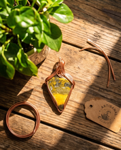 Load image into Gallery viewer, Handcrafted sterling silver Bumblebee Jasper pendant featuring bold yellow and black natural stone patterns.

