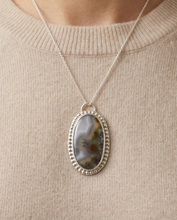 Load image into Gallery viewer, Oval scenic agate pendant with natural landscape pattern set in sterling silver.
