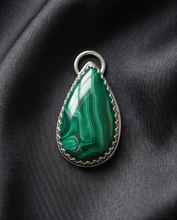 Load image into Gallery viewer, Lifestyle image of handcrafted sterling silver Malachite teardrop pendant worn on chain featuring natural green gemstone banding
