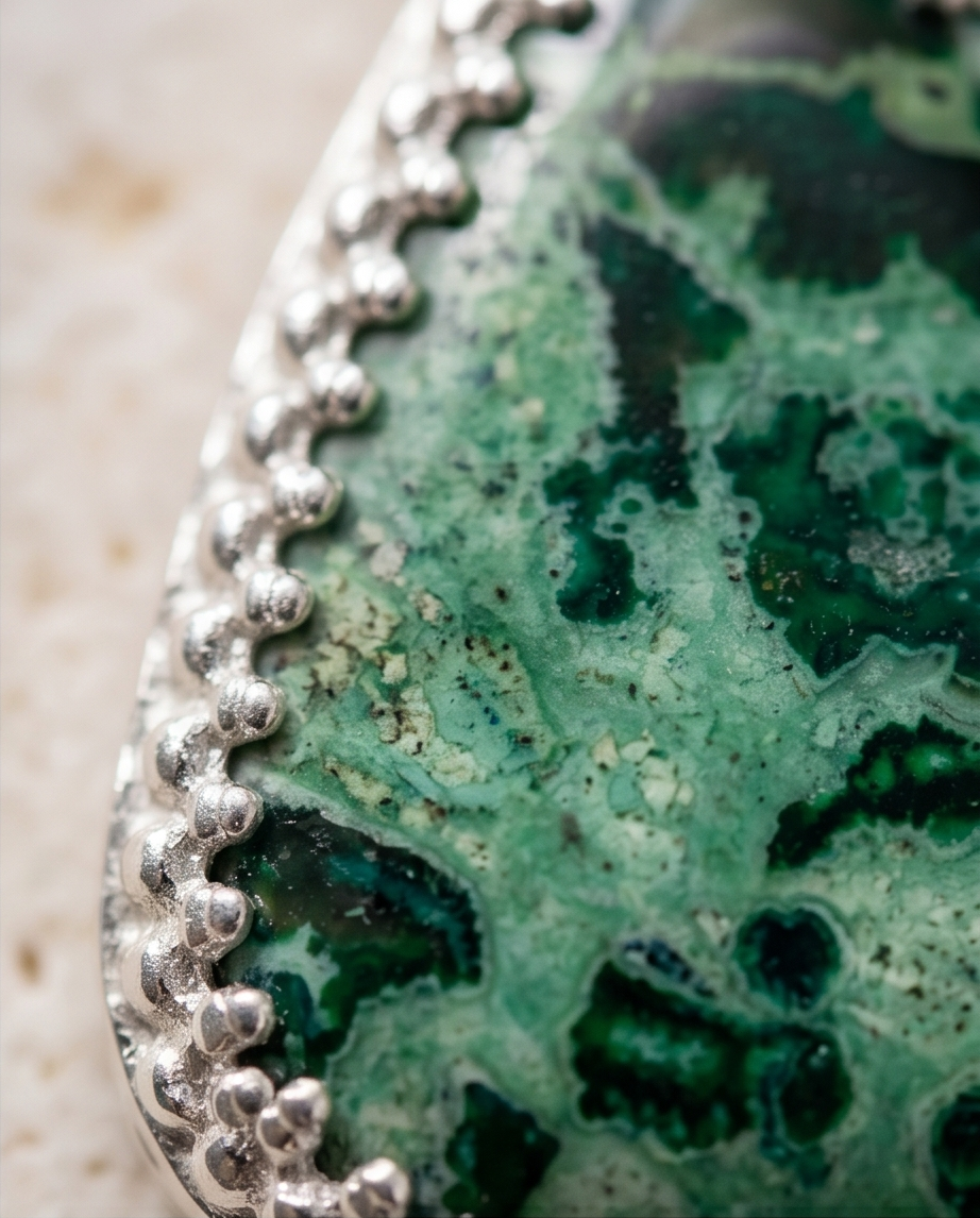 Handcrafted sterling silver Malachite pendant featuring natural green gemstone patterns in an artisan setting by K’sKreations
