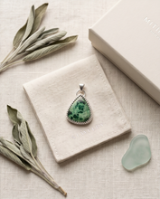 Load image into Gallery viewer, Handcrafted sterling silver Malachite pendant featuring natural green gemstone patterns in an artisan setting by K’sKreations
