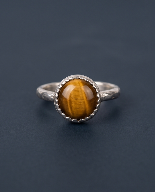 Handcrafted sterling silver ring featuring an 8 mm genuine Tiger’s Eye gemstone