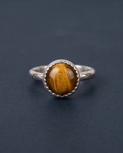 Load image into Gallery viewer, Handcrafted sterling silver ring featuring an 8 mm genuine Tiger’s Eye gemstone