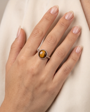 Load image into Gallery viewer, Handcrafted sterling silver ring featuring an 8 mm genuine Tiger’s Eye gemstone