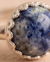 Load image into Gallery viewer, Handcrafted sterling silver ring featuring a 10 mm blue and white Sodalite gemstone